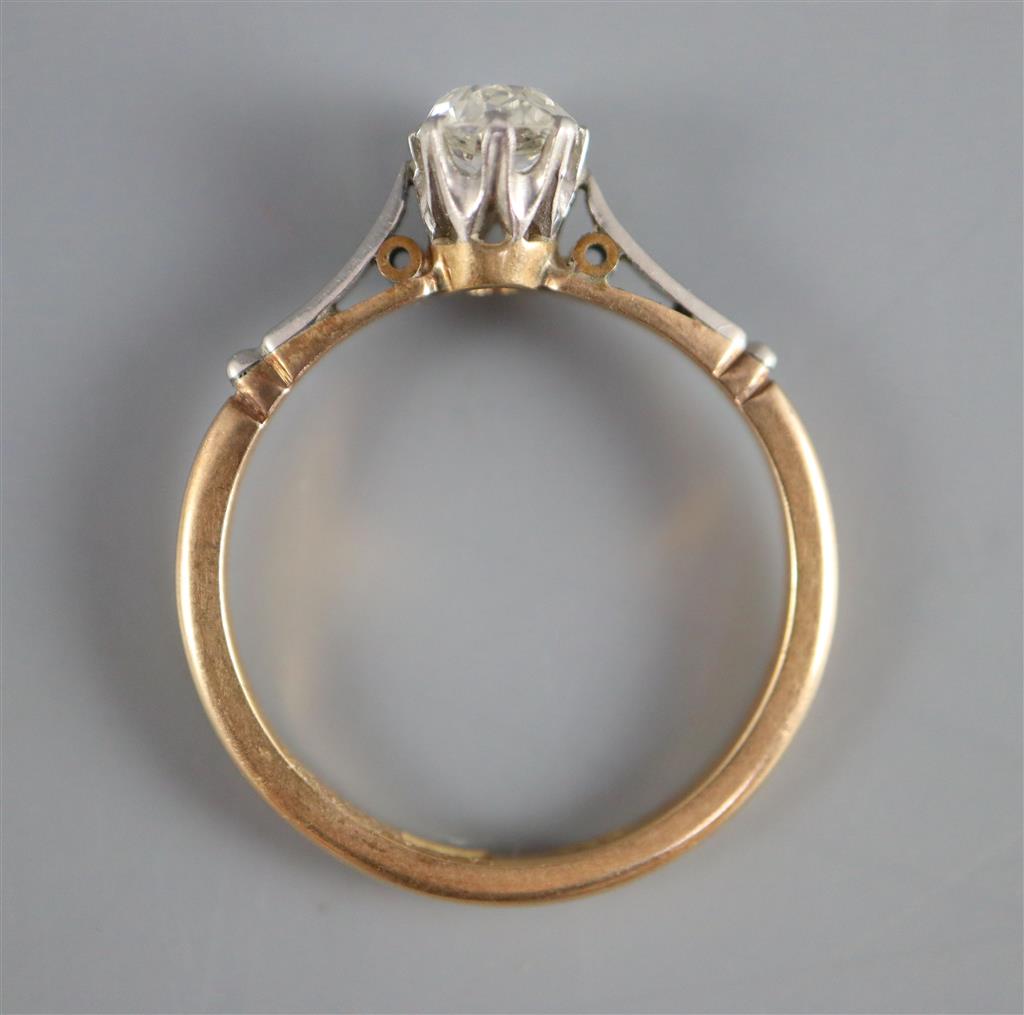 An 18ct gold and platinum, solitaire diamond ring,